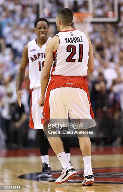 Greivis Vasquez of the Toronto Raptors does a little dance after hitting a 3 pointer against the Washington Wizards in Game One of the NBA Eastern...