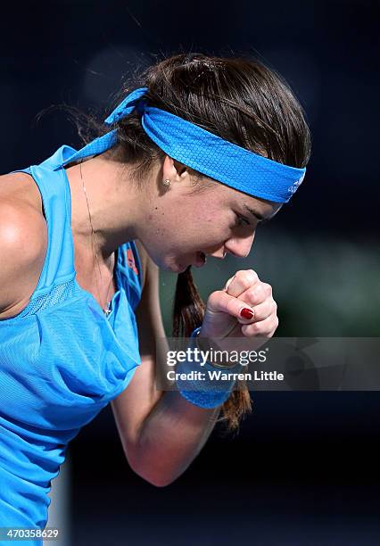 Sorana Cirstea of Romania celebrates a point againt Sara Errani of Italy during day three of the WTA Dubai Duty Free Tennis Championship at the Dubai...