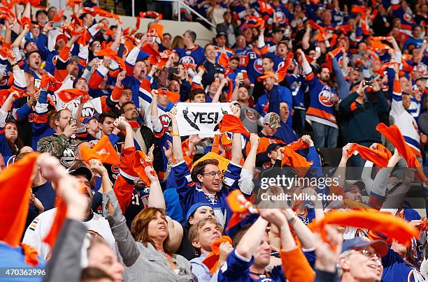 New York Islander fans cheer for their team during the game against the Washington Capitals during Game Three of the Eastern Conference Quarterfinals...