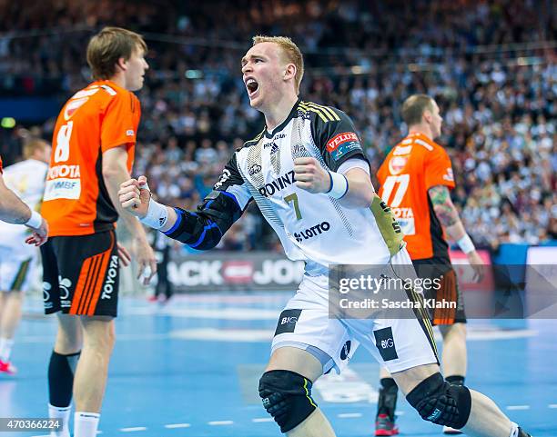 Rene Toft Hansen of Kiel celebrates one of his goals during the VELUX EHF Champions League Quarter Final between THW Kiel and Pick Szeged at...