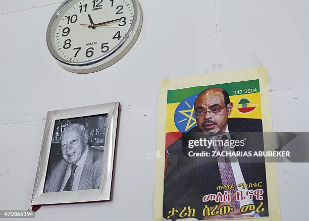 Photo taken on April 15, 2015 shows a portrait of Aram Sarafian, the founder of the Varjabedian family business, next to the photograph of the late...