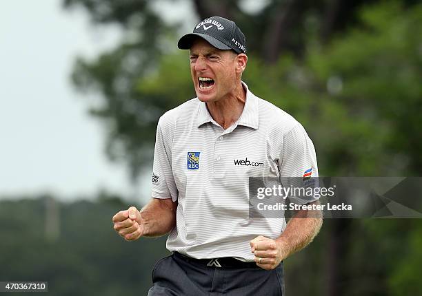 Jim Furyk makes a birdie putt on the second playoff hole against Kevin Kisner to win the RBC Heritage at Harbour Town Golf Links on April 19, 2015 in...