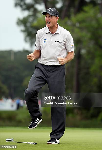 Jim Furyk makes a birdie putt on the second playoff hole against Kevin Kisner to win the RBC Heritage at Harbour Town Golf Links on April 19, 2015 in...