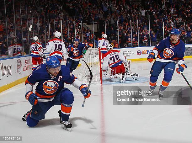 John Tavares of the New York Islanders celebrates his game winning goal at 15 seconds of the overtime against the Washington Capitals in Game Three...