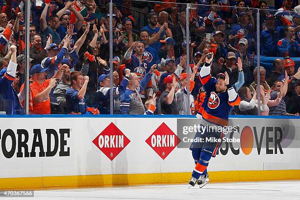 Lubomir Visnovsky of the New York Islanders celebrates their win against the Washington Capitals during Game Three of the Eastern Conference...