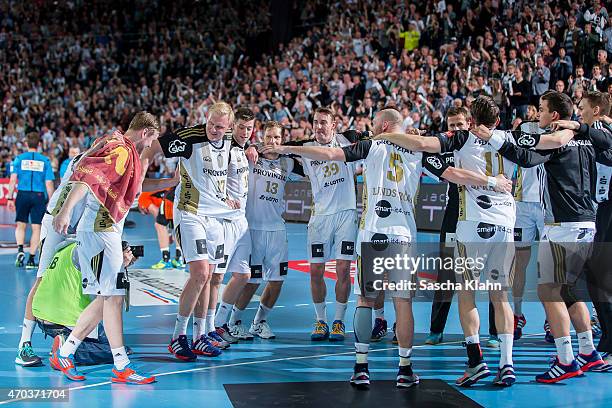 The team of THW Kiel celebrates their win during the VELUX EHF Champions League Quarter Final between THW Kiel and Pick Szeged at Sparkassen Arena on...