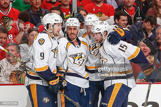 Filip Forsberg, Mike Ribeiro, Mattias Ekholm and Craig Smith of the Nashville Predators celebrate after Ribeiro scored against the Chicago Blackhawks...