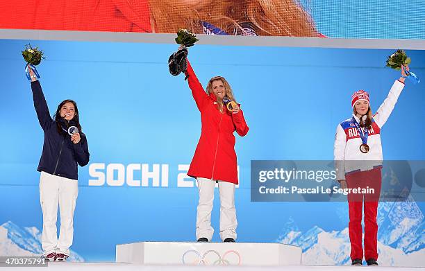 Silver medalist Tomoka Takeuchi of Japan, gold medalist Patrizia Kummer of Switzerland and bronze medalist Alena Zavarzina of Russia celebrate on the...