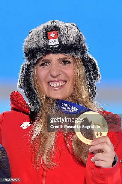 Gold medalist Patrizia Kummer of Switzerland celebrates during the medal ceremony for the Women's Parallel Giant Slalom on day twelve of the Sochi...