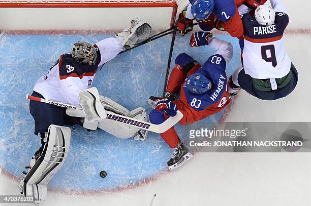 Czech Republic's Ales Hemsky vies to score with US goalkeeper Jonathan Quick during the Men's Ice Hockey Quarterfinals match between the USA and the...