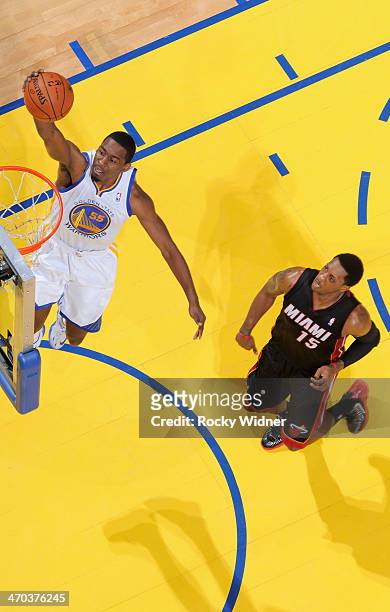 Jordan Crawford of the Golden State Warriors dunks against the Miami Heat on February 12, 2014 at Oracle Arena in Oakland, California. NOTE TO USER:...
