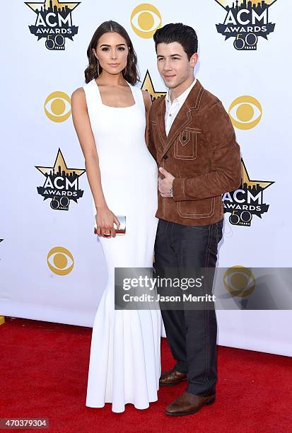 Olivia Culpo and singer/actor Nick Jonas attend the 50th Academy of Country Music Awards at AT&T Stadium on April 19, 2015 in Arlington, Texas.