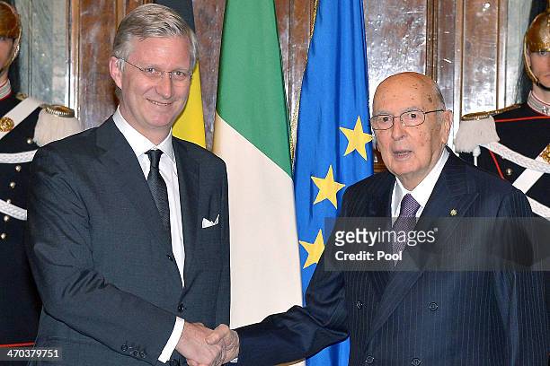 King Philippe of Belgium greets Italian President Giorgio Napolitano as he arrives at Quirinale Palace on February 19, 2014 in Rome, Italy.
