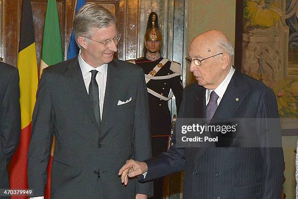 King Philippe of Belgium greets Italian President Giorgio Napolitano as he arrives at Quirinale Palace on February 19, 2014 in Rome, Italy.