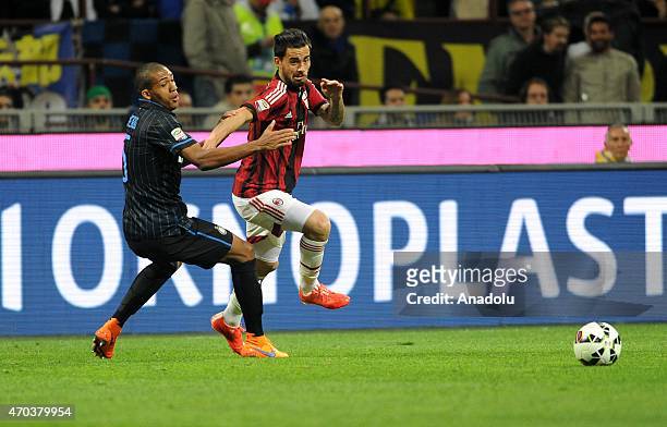 Juan Jesus of FC Internazionale in action with Suso of AC Milan during the Serie A match between FC Internazionale Milano and AC Milan at Stadio...