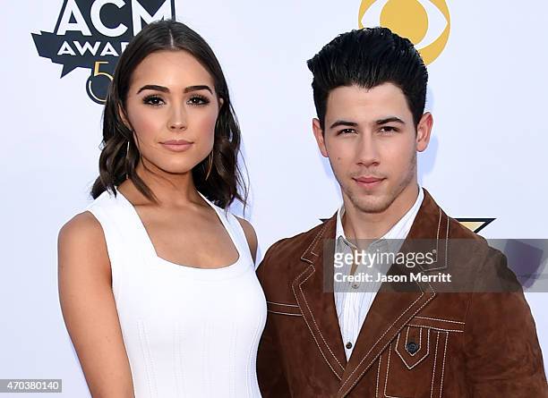 Olivia Culpo and singer/actor Nick Jonas attend the 50th Academy of Country Music Awards at AT&T Stadium on April 19, 2015 in Arlington, Texas.