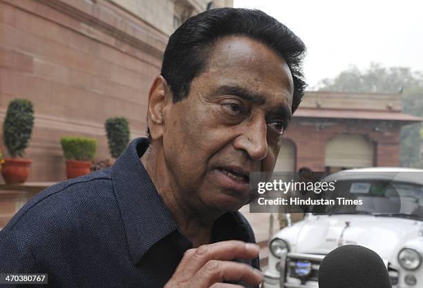 Parliamentary Affairs Minister Kamal Nath speaks with media person after attending Lok Sabha session at Parliament House on February 19, 2014 in New...