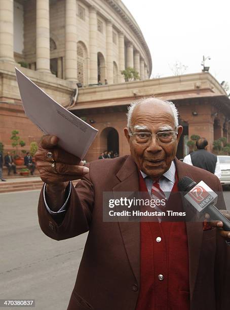 Noted lawyer and Rajya Sabha member Ram Jethmalani speaks with media person after attending Parliament session on February 19, 2014 in New Delhi,...