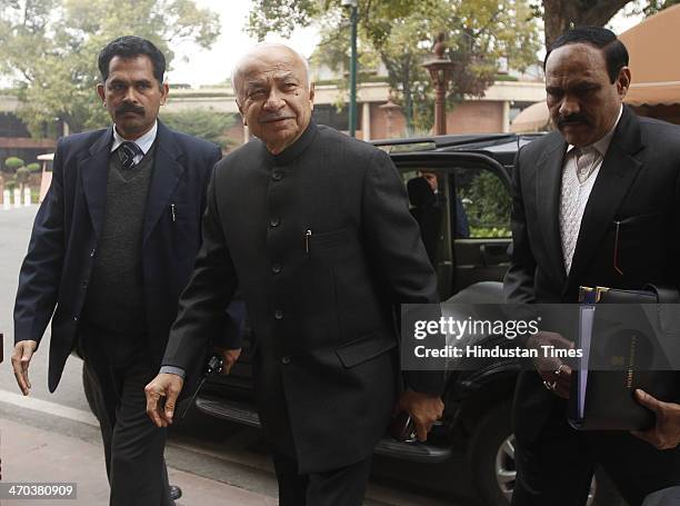 Home Minister Sushilkumar Shinde arrives to attend the Parliament session on February 19, 2014 in New Delhi, India. Lok Sabha adjourned for the day...