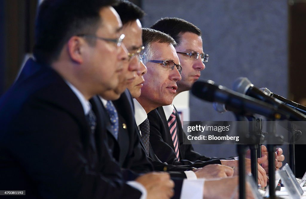PSA Peugeot Citroen Chief Executive Officer Carlos Tavares And Dongfeng Motor Co. Chief Executive Officer Xu Ping Joint News Conference