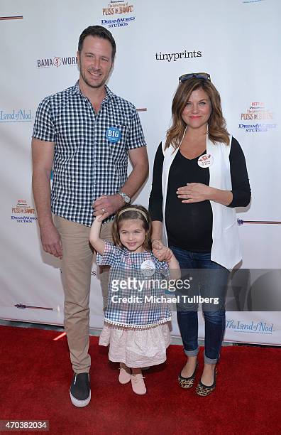 Actress Tiffani Thiessen , husband Brady Smith and daughter Harper Renn Smith attend the 6th annual Milk + Bookies Story Time Celebration at Skirball...