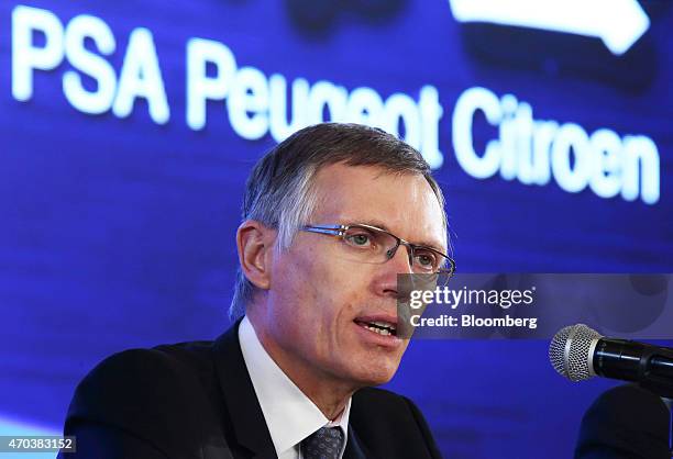 Carlos Tavares, chief executive officer of PSA Peugeot Citroen, speaks during a joint news conference with Xu Ping, chairman of Dongfeng Motor Group...