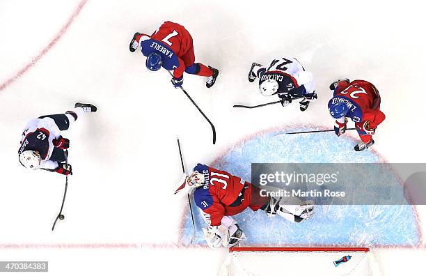 David Backes of the United States scores his team's third goal in the first period against Ondrej Pavelec of the Czech Republic during the Men's Ice...