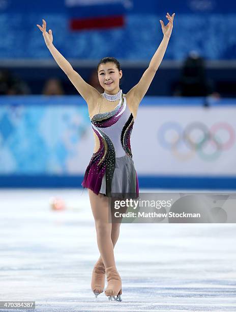 Kanako Murakami of Japan reacts after competing in the Figure Skating Ladies' Short Program on day 12 of the Sochi 2014 Winter Olympics at Iceberg...