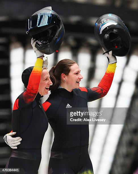 Cathleen Martini and Christin Senkel of Germany team 2 celebrate during the Women's Bobsleigh on Day 12 of the Sochi 2014 Winter Olympics at Sliding...