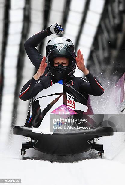 Jamie Greubel and Aja Evans of the United States team 2 celebrate during the Women's Bobsleigh on Day 12 of the Sochi 2014 Winter Olympics at Sliding...