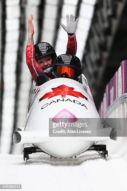 Kaillie Humphries and Heather Moyse of Canada team 1 celebrate winning the gold medal during the Women's Bobsleigh on Day 12 of the Sochi 2014 Winter...