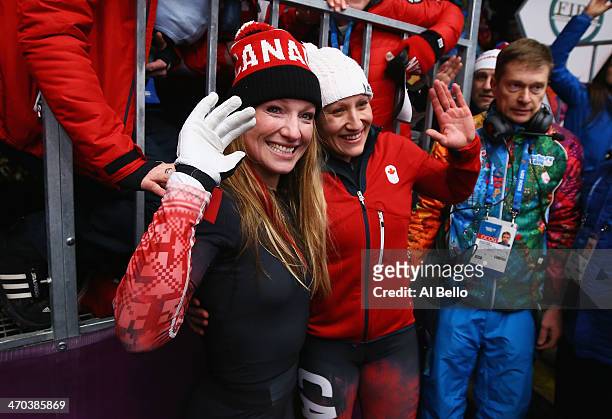 Kaillie Humphries and Heather Moyse of Canada team 1 celebrate after winning the gold medal during the Women's Bobsleigh on Day 12 of the Sochi 2014...