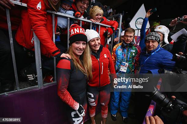 Kaillie Humphries and Heather Moyse of Canada team 1 celebrate after winning the gold medal during the Women's Bobsleigh on Day 12 of the Sochi 2014...