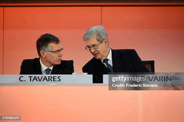 French manufacturer PSA Peugeot Citroen's current chairman Philippe Varin with newly-appointed CEO Carlos Tavares during the French manufacturer PSA...