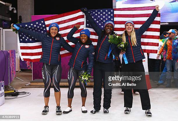 Silver medallists Elana Meyers and Lauryn Williams of the United States team 1 pose with bronze medallists Jamie Greubel and Aja Evans of the United...