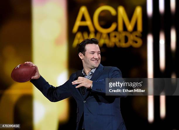 Dallas Cowboys quarterback Tony Romo speaks onstage during the 50th Academy of Country Music Awards at AT&T Stadium on April 19, 2015 in Arlington,...