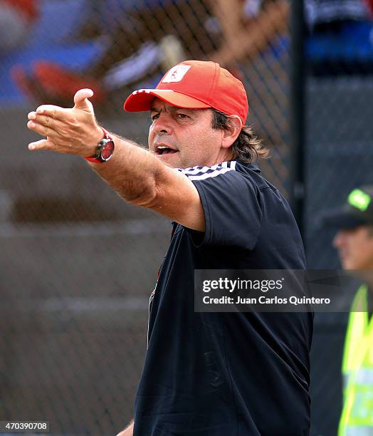 Fernando Velasco, coach of América de Cali shouts instructions to his players during a match between Depor FC and America de Cali as part of 10th...