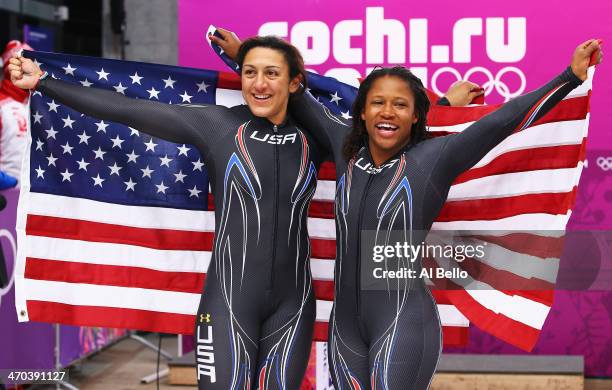 Silver medallists Elana Meyers and Lauryn Williams of the United States team 1 pose during the Women's Bobsleigh on Day 12 of the Sochi 2014 Winter...
