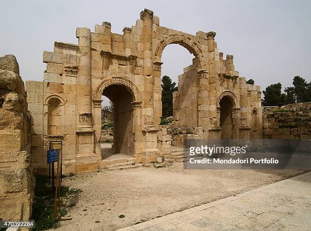 "South Gate 2nd Century A.D., stone building Jordan, Jerash. Whole artwork view. View of the facade of the monumental gate through which the visitors...