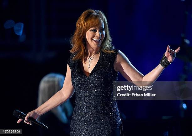 Honoree Reba McEntire performs onstage during the 50th Academy of Country Music Awards at AT&T Stadium on April 19, 2015 in Arlington, Texas.