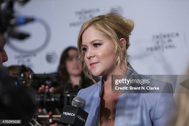 Comedian Amy Schumer speaks to the media during Tribeca Talks: Inside Amy Schumer during the 2015 Tribeca Film Festival at Spring Studios on April...