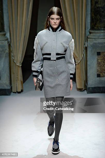 Model walks the runway at the Fay Autumn Winter 2014 fashion show during Milan Fashion Week on February 19, 2014 in Milan, Italy.