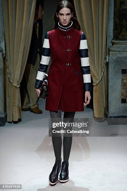 Model walks the runway at the Fay Autumn Winter 2014 fashion show during Milan Fashion Week on February 19, 2014 in Milan, Italy.