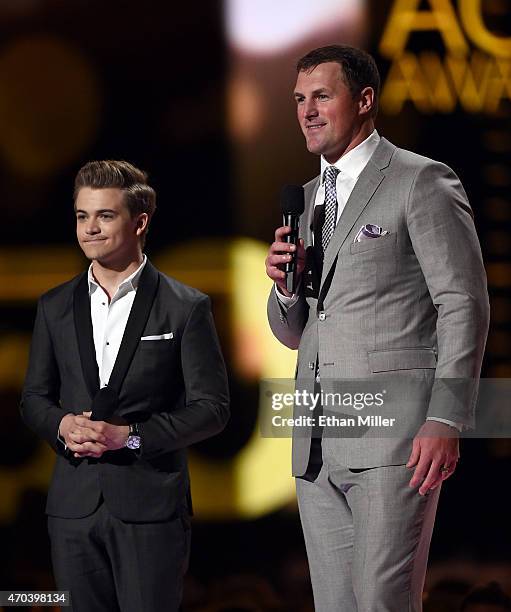 Recording artist Hunter Hayes and Dallas Cowboys tight end Jason Witten speak onstage during the 50th Academy of Country Music Awards at AT&T Stadium...