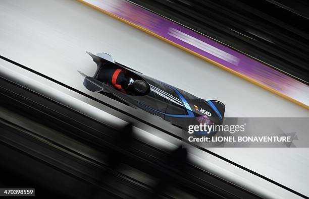 Germany-2 two-woman bobsleigh pilot Cathleen Martini and brakewoman Christin Senkel compete in the Women's Bobsleigh Heat 4 and final run at the...