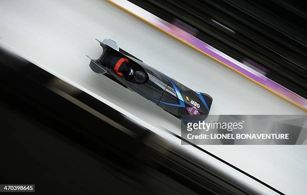Germany-2 two-woman bobsleigh pilot Cathleen Martini and brakewoman Christin Senkel compete in the Women's Bobsleigh Heat 4 and final run at the...