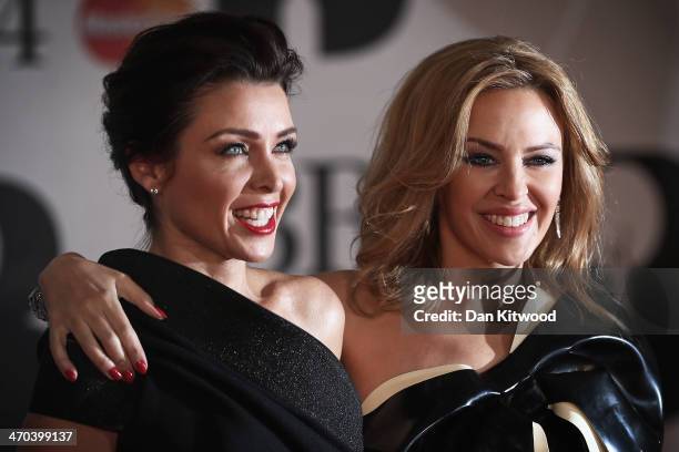 Kylie Minogue and sister Danii Minogue attend the BRIT Awards 2014 at 02 Arena on February 19, 2014 in London, England.