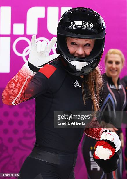 Heather Moyse of Canada team 1 celebrates on the way to winning the gold medal during the Women's Bobsleigh on Day 12 of the Sochi 2014 Winter...