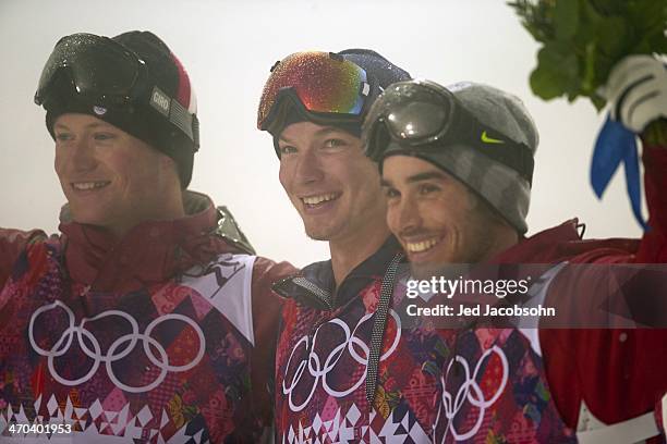 Winter Olympics: Closeup of Canada Mike Riddle , USA David Wise , and France Kevin Rolland victorious after Men's Ski Halfpipe Final at Rosa Khutor...