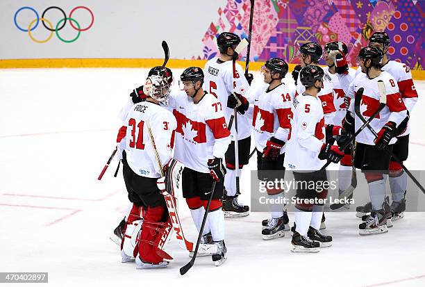 Canada celebrates after defeating Latvia 2-1 during the Men's Ice Hockey Quarterfinal Playoff on Day 12 of the 2014 Sochi Winter Olympics at Bolshoy...